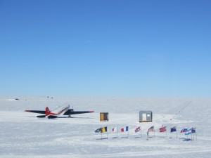 Ceremonial South Pole, surrounded by the flags of the Antarctic Treaty nations.