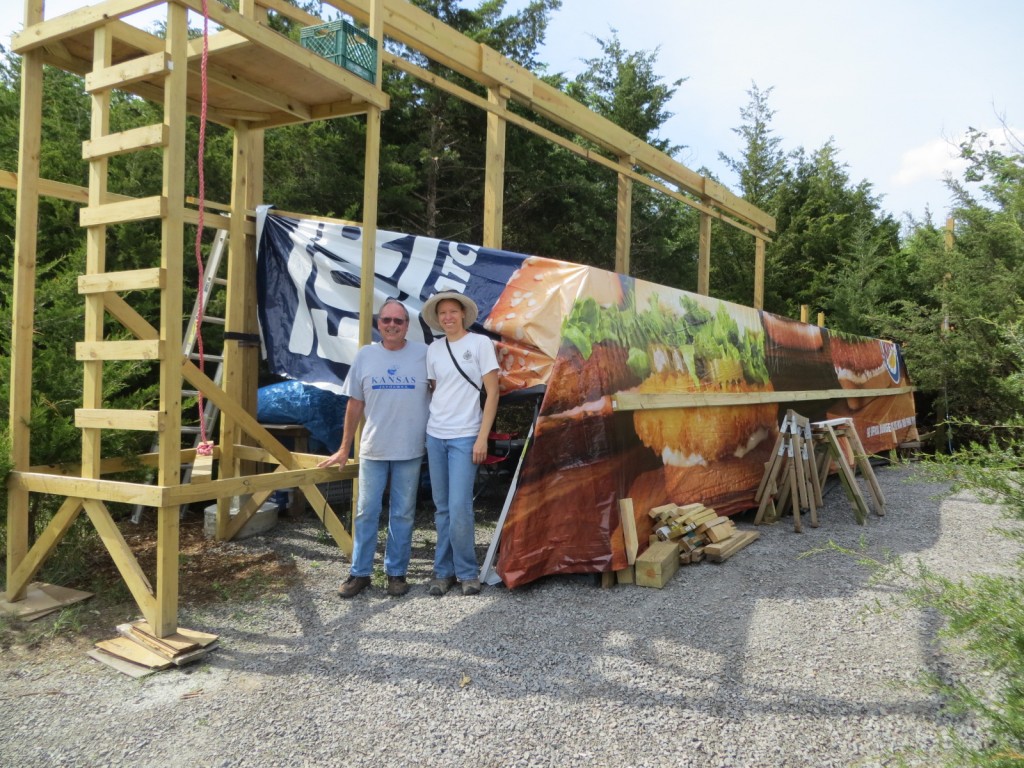 Finished temporary shelter.  Yes, the tarp is a big billboard sign. 