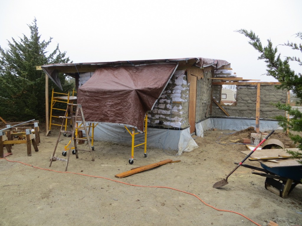 tarped earthbag utility room