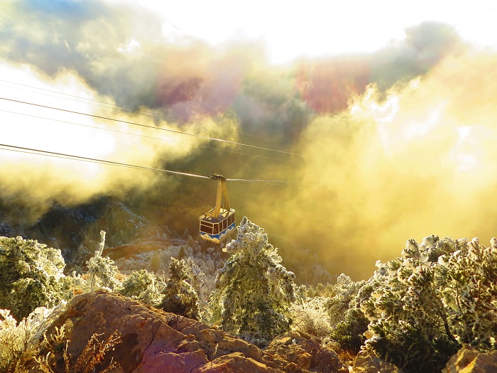 The Sandia Peak Tram descending into the clouds.